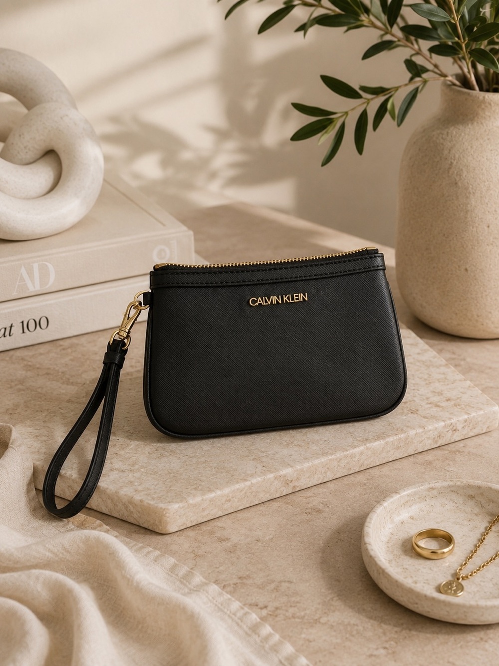 Calvin Klein Black and Gold Wristlet